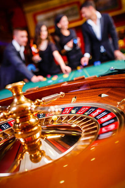 Live casino studio with professional dealer, multi-camera setup, and real-time betting interface on ink789